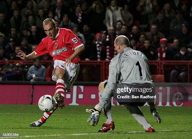 Danny Murphy of Charlton Athletic slides the ball past Brad Friedel of Blackburn Rovers to score the first goal during the Carling Cup Fourth Round...