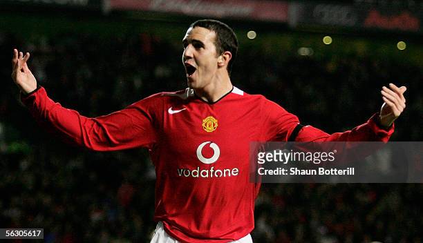 John O'Shea of Manchester United celebrates scoring his teams third goal during the Carling Cup match between Manchester United and West Bromwich...