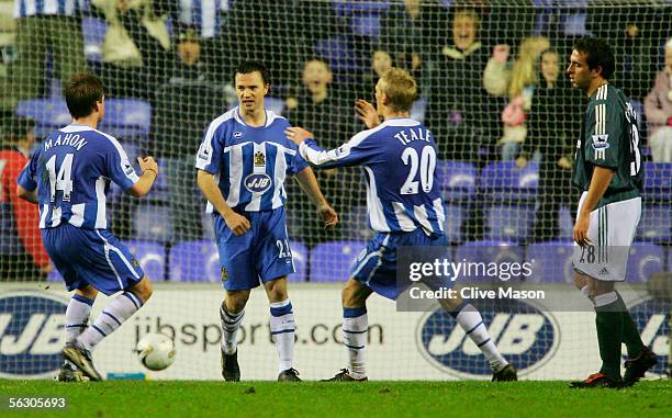 David Connolly of Wigan Athletic celebrates his goal during the Carling Cup, fourth round match between Wigan Athletic and Newcastle United at the...