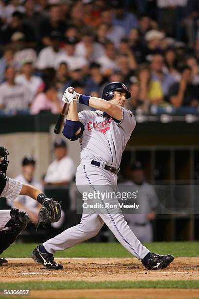 Travis Hafner of the Cleveland Indians bats as A.J. Pierzynski of the Chicago White Sox catches during the game against at U.S. Cellular Field on...