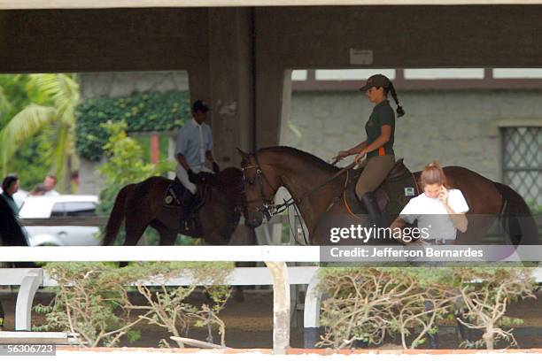 Athina Onassis and her Brazilian boyfriend Alvaro Alfonso de Miranda Neto, known as Doda, during its training day at the Paulista Hipica Society on...