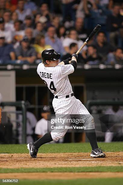 Joe Crede of the Chicago White Sox hits a walk off home run during the bottom of the tenth inning against the Cleveland Indians at U.S. Cellular...