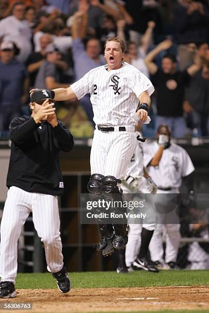 Mark Buehrle and A.J. Pierzynski of the Chicago White Sox celebrate a walk-off win against the Cleveland Indians at U.S. Cellular Field on September...