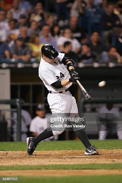 Joe Crede of the Chicago White Sox bats during the game against the Cleveland Indians at U.S. Cellular Field on September 20, 2005 in Chicago,...