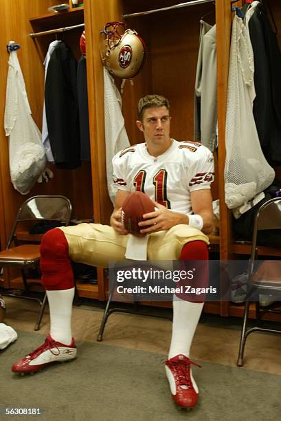 Quarterback Alex Smith of the San Francisco 49ers in the locker room before the game against the Tennessee Titans at the Coliseum in Nashville,...