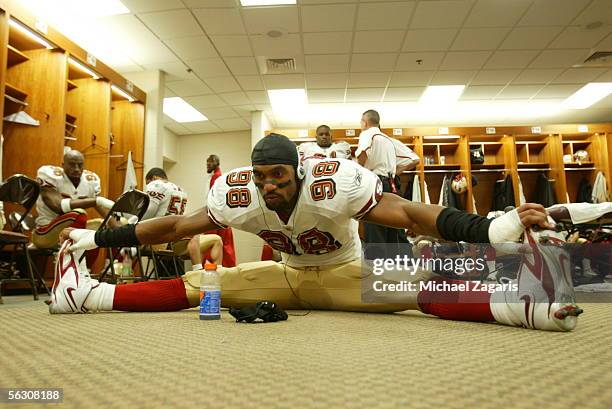 Linebacker Julian Peterson of the San Francisco 49ers stretches in the locker room before the game against the Tennessee Titans at the Coliseum in...