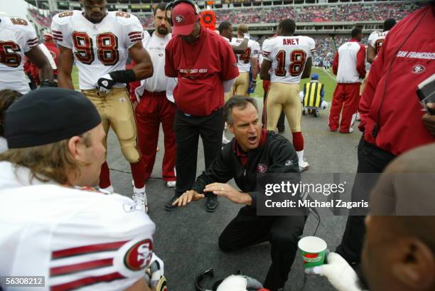 Head Coach Mike Nolan of the San Francisco 49ers addresses players during the game against the Tennessee Titans at the Coliseum in Nashville,...