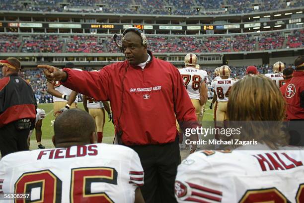 Defensive line coach Gary Emanuel of the San Francisco 49ers addresses players during the game against the Tennessee Titans at the Coliseum in...