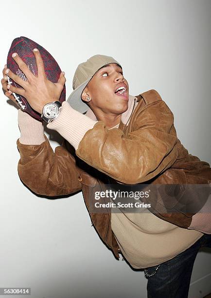 Rapper Chris Brown poses for a photo backstage during MTV's Total Request Live at the MTV Times Square Studios on November 30, 2005 in New York City.