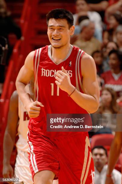Yao Ming of the Houston Rockets runs upcourt during the game against the Miami Heat at American Airlines Arena on November 10, 2005 in Miami,...