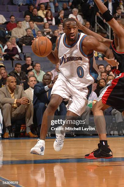 Gilbert Arenas of the Washington Wizards drives to the basket against the Portland Trail Blazers on November 30, 2005 at the MCI Center in Washington...