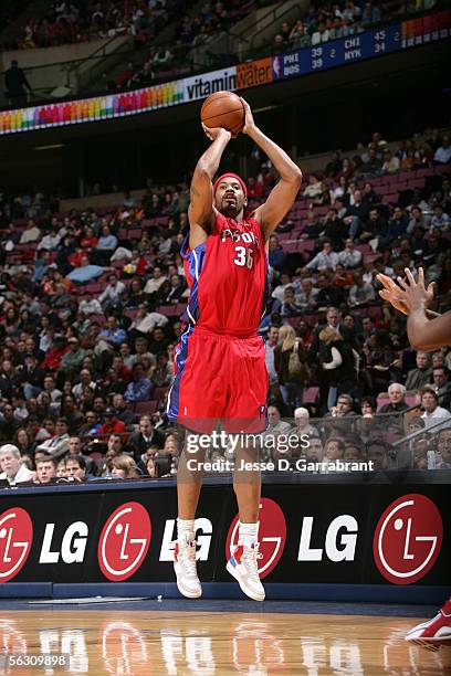 Rasheed Wallace of the Detroit Pistons shoots against the New Jersey Nets on November 30, 2005 at the Continental Airlines Arena in East Rutherford,...