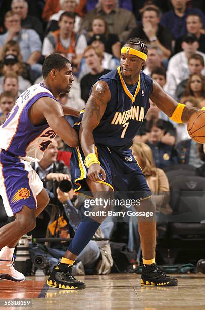 Kurt Thomas of the Phoenix Suns guards Jermaine O'Neal of the Indiana Pacers on November 30, 2005 at America West Arena in Phoenix, Arizona. NOTE TO...