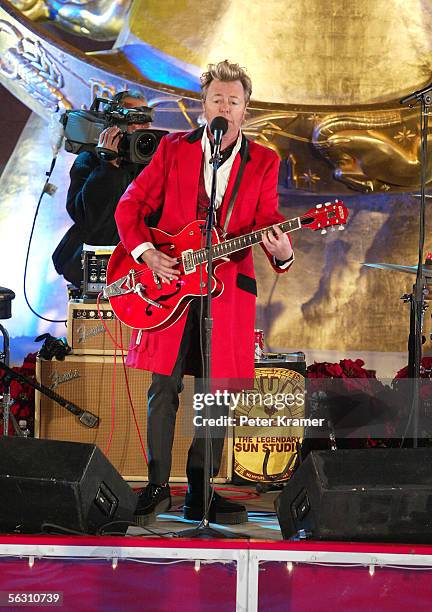 Brian Setzer performs at the lighting of the 73rd annual Rockefeller Center tree November 30, 2005 in New York City.