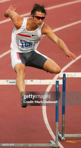 Brendan Cole of the ACT competes in the Mens 400 Metres Hurdles during the Telstra Zatopek Classic at Olympic Park on December 1, 2005 in Melbourne,...