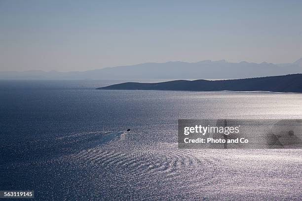 boat on the sea along coast greek islands - skyros stockfoto's en -beelden
