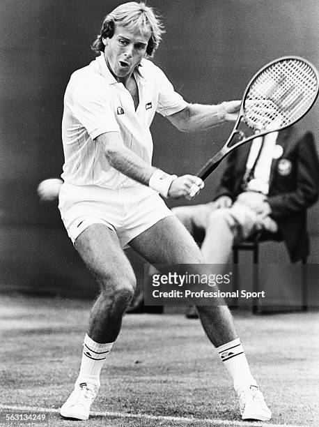 British tennis player John Lloyd in action against Andreas Maurer at Wimbledon Tennis Championships, London, June 1984.