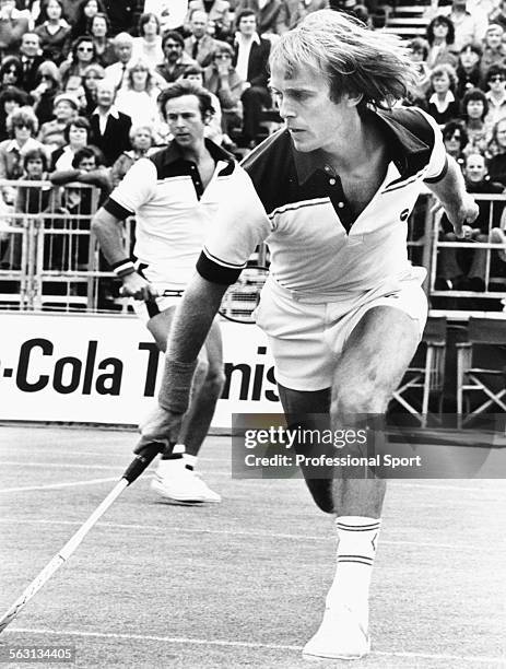 British tennis players John Lloyd and David Lloyd in action in a Men's Doubles match against Romania during a Davis Cup competition in 1980.