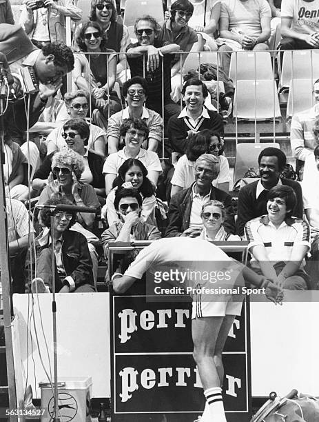 Romanian tennis player Ilie Nastase entertains the crowds by putting his head in a fridge during the French Open Tennis Championships at Roland...