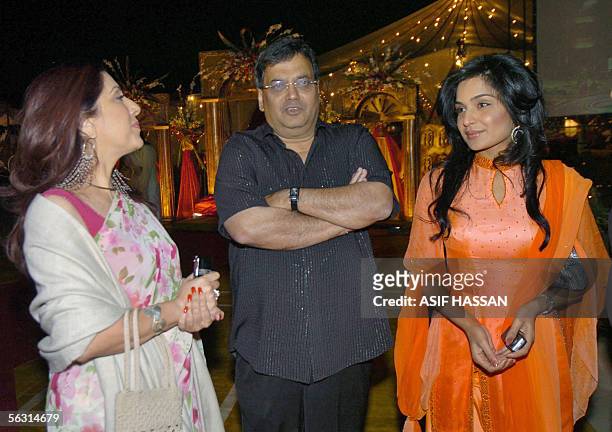 Indian film producer Subhash Ghai talks with Pakistani producer Samina Pirzada and Pakistani popular film actress Meera prior to the opening ceremony...