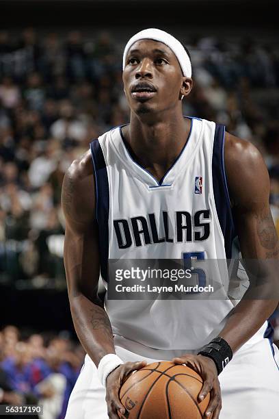 Josh Howard of the Dallas Mavericks prepares to shoot a free throw during a game against the Detroit Pistons at the American Airlines Center on...
