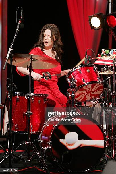 Meg White of the White Stripes performs on "The Daily Show With Jon Stewart," the first live band performance for the show, December 1, 2005 in New...