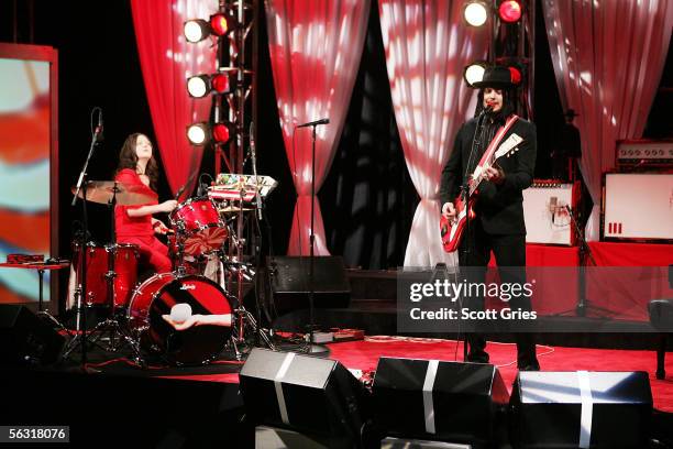 Jack White and Meg White of the White Stripes perform on "The Daily Show With Jon Stewart," the first live band performance for the show, December 1,...