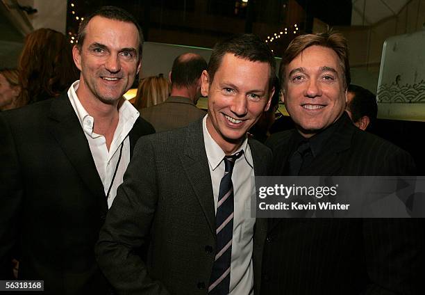 Publicist Stephen Huvane, GQ editor-in-cheif Jim Nelson and agent Kevin Huvane pose inside at the GQ 2005 Men Of The Year celebration at Mr. Chow...