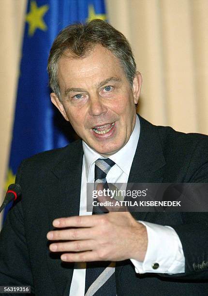British Prime Minister Tony Blair answers a journalist's question at the Hunter Hall of the parliament building 02 December 2005 in Budapest, after a...