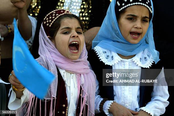 Iraqi Kurd Turkuman, clad in traditional cutomes, sing at al-Jadriyah club in Baghdad, during a bazaar organized by members of the Ma'an Coalition...