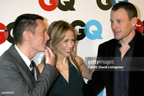 Editor-in-chief Jim Nelson, musician Sheryl Crow and bicyclist Lance Armstrong arrive at GQ magazine's 2005 "Men Of The Year" celebration held at Mr....