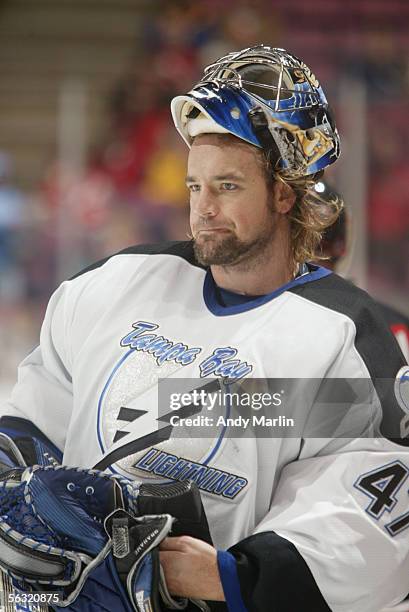 Goalie John Grahame of the Tampa Bay Lightning looks on against the New Jersey Devils during a game at the Continental Airlines Arena on October 26,...