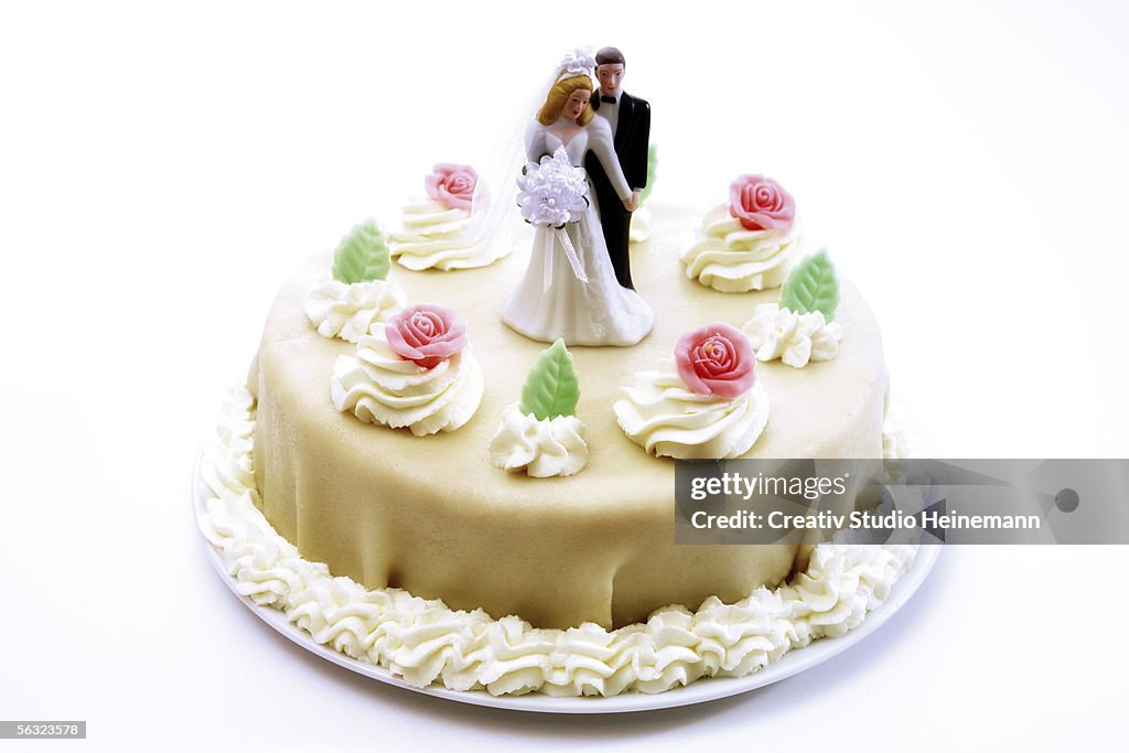 Wedding cake topper with bride and groom