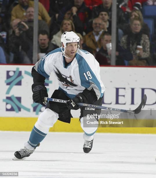 Joe Thornton of the San Jose Sharks skates against the Buffalo Sabres in his first game with the Sharks on December 2, 2005 at HSBC Arena in Buffalo,...