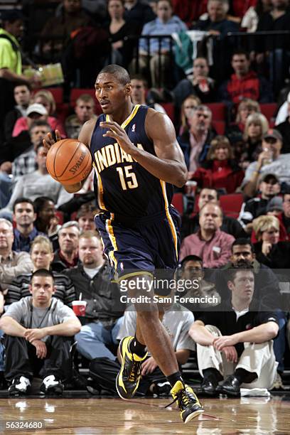 Ron Artest of the Indiana Pacers dribbles the ball during a game against the Portland Trail Blazers on December 2, 2005 at the Rose Garden Arena in...