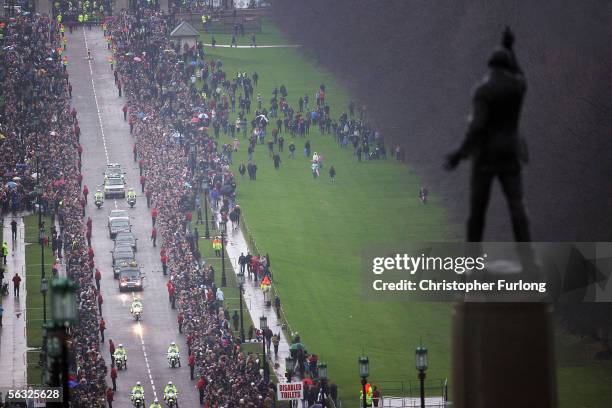 The funeral cortege of footballer George Best makes it's way along Prince Of Wales Avenue in the grounds of Stormont Parliament building on December...