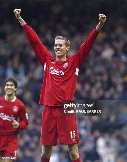 Liverpool, United Kingdom: Liverpool's Peter Crouch celebrates after soring his first goal for Liverpool against Wigan at Anfield, in Liverpool, 03...