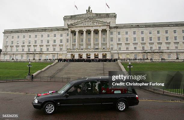 The funeral cortege for footballer George Best makes its way from the service at Stormont Parliament buildings Great Hall to Roselawn Cemetery in...