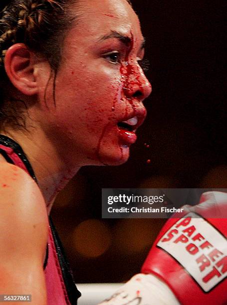 Elena Reed Elena Reid of USA looks on with bloody face due to a cut during the ...
