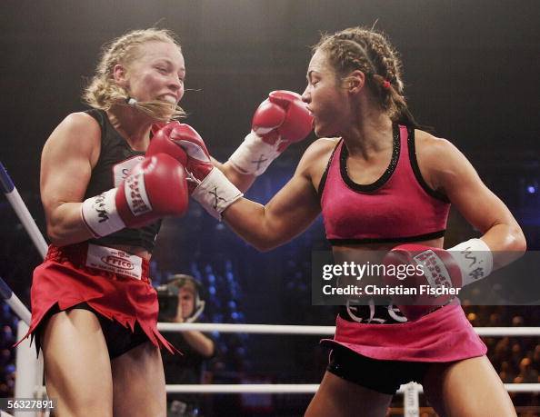 Elena Reed Regina Halmich of Germany hits Elena Reid of USA during the Women's ...