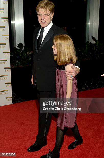 Actor, Director Robert Redford escorts his grandaughter Lena Redford down the red carpet at the U.S. State Department at a gala celebration for...