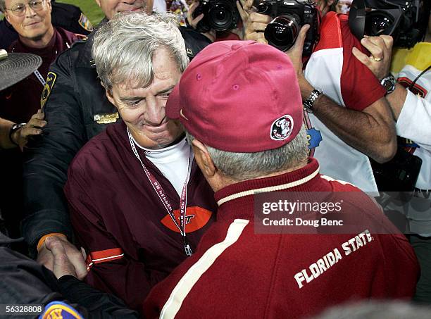 Head coach Frank Beamer of the Virginia Tech Hokies congratulates head coach Bobby Bowden of the Florida State Seminoles in the third quarter in the...