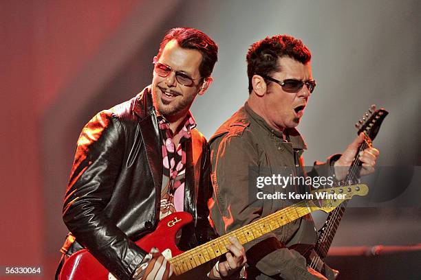 Musicians Kirk Pengilly and Tim Farriss of INXS perform onstage at the VH1 Big In '05 Awards held at Stage 15 on the Sony lot on December 3, 2005 in...