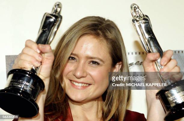 German actress Julia Jentsch holds her awards for best actress for her role in "The Last Days of Sophie Scholl" and the public's award, during the...