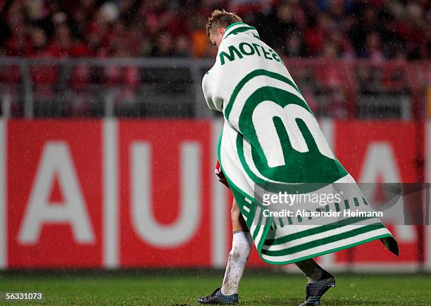 Andre Lenz of Wolfsburg leaves the ground after the Bundesliga match between 1. FSV Mainz 05 and VfL Wolfsburg at the Bruchweg Stadium on December 4,...