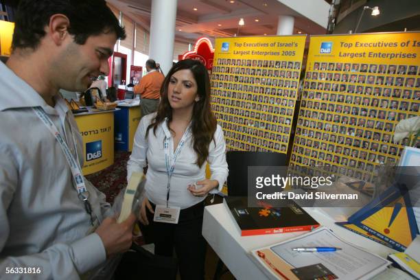 An Israeli businessman visits the Dunn and Bradstreet stall during the annual Israeli Business Conference for the country's leading entrepreneurs...