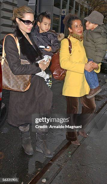 Angelina Jolie and her son Maddox arrive at the Snow Show on 17th Street and Park with Marianne Pearl, widow of slain Wall Street Journal reporter...