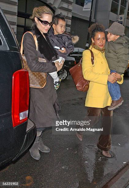 Angelina Jolie and her son Maddox arrive at the Snow Show on 17th Street and Park with Marianne Pearl, widow of slain Wall Street Journal reporter...