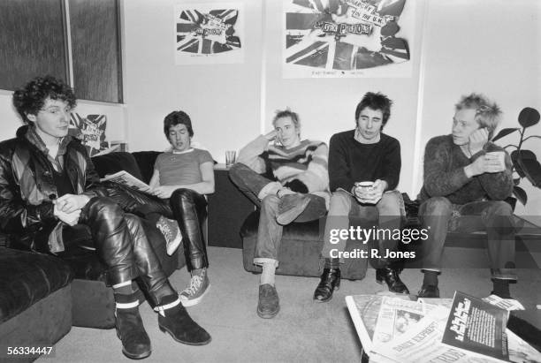 Notorious British punk rock band The Sex Pistols at the EMI studios, 2nd December 1976. From left to right, manager Malcolm McLaren, Steve Jones,...