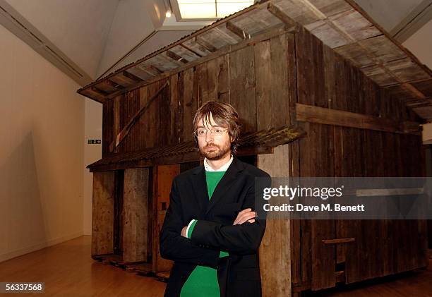 The Turner Prize winner of 2005, Simon Starling, poses near his award winning project "Shedboatshed" at the Turner Prize 2005 at Tate Britain on...